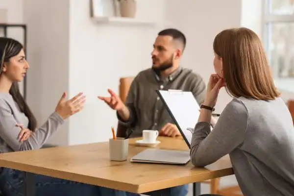 Image of couple access free mediation using family mediation voucher scheme Blandford Forum
